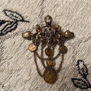 Vintage crest dangle brooch